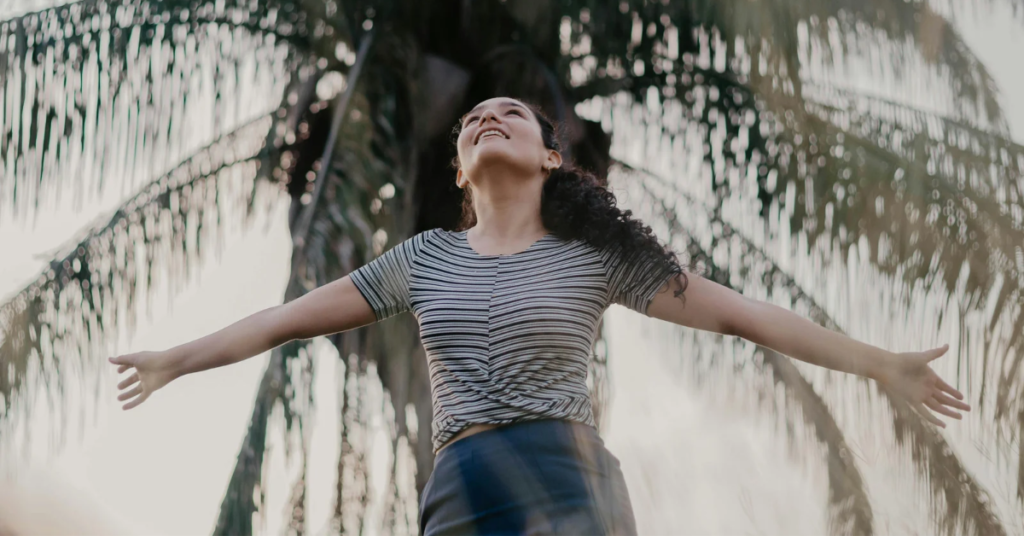 A happy woman after rebuilding herself