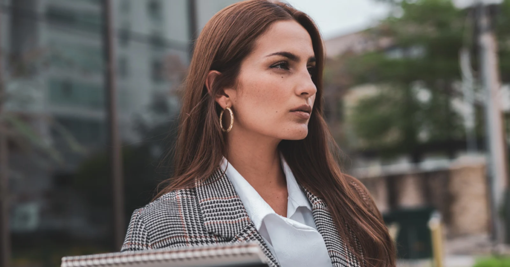 Empowered woman with a strong, confident posture, ready to lead and break free from gender biases
