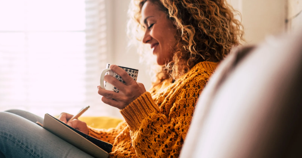 Empowered woman setting personal and financial goals with the guidance of life coaching.