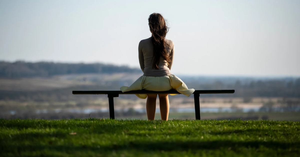 Woman seeking clarity and emotional healing through life coaching