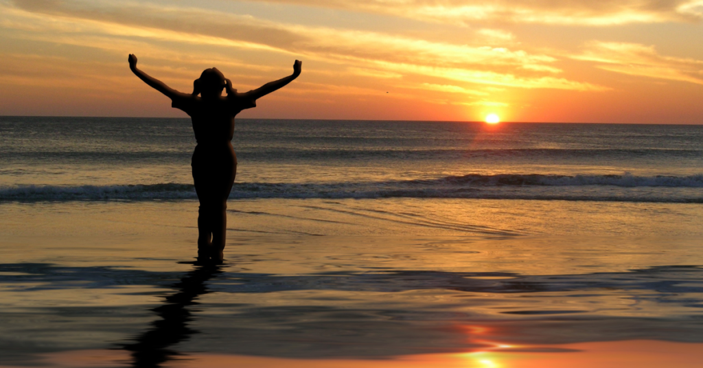 A working mom taking a short walk in nature to reset and reduce stress.